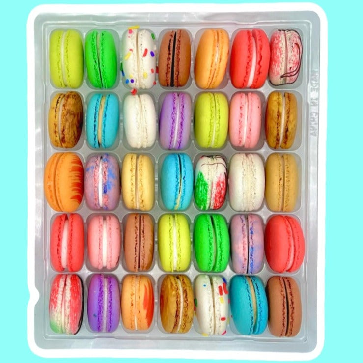 A pack of colorful macarons in various flavors and colors.