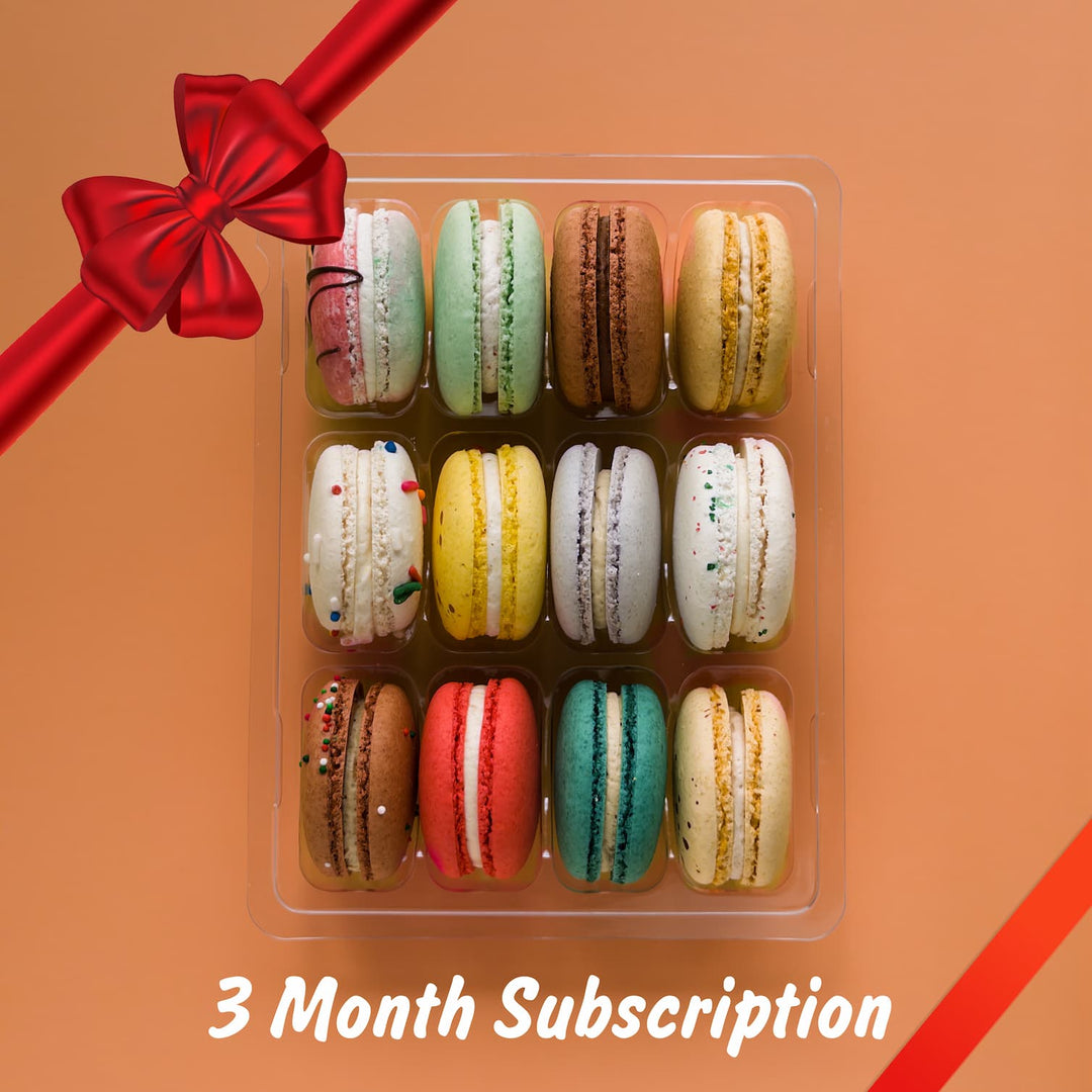 12 pack of a variety of macarons on a bronze background with a red bow superimposed